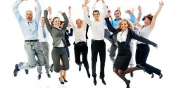 Successful business group jumping together.
